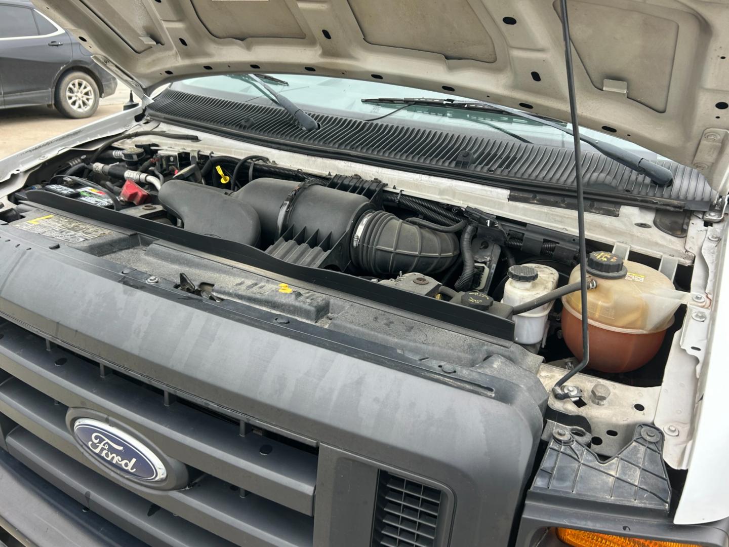 2010 White /Gray Ford E-Series Van E-250 (1FTNE2EL2AD) with an 5.4L V8 SOHC 16V engine, 4-Speed Automatic transmission, located at 17760 Hwy 62, Morris, OK, 74445, (918) 733-4887, 35.609104, -95.877060 - 2010 FORD E-SERIES VAN E-250 5.4 V8 DEDICATED CNG (COMPRESSED NATURAL GAS) DOES NOT RUN ON GASOLINE. FEATURES MANUAL SEATS, MANUAL LOCKS, MANUAL WINDOWS, MANUAL MIRRORS, AM/FM STEREO. IT IS EQUIPPED WITH A CNG FUELING SYSTEM, IT RUNS ON COMPRESSED NATURAL GAS. A PREMIER ALTERNATIVE FUEL THAT IS EXTR - Photo#21